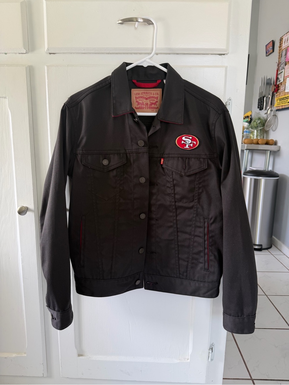 Levi's Black Jean Trucker Jacket with Red 49ers Patch